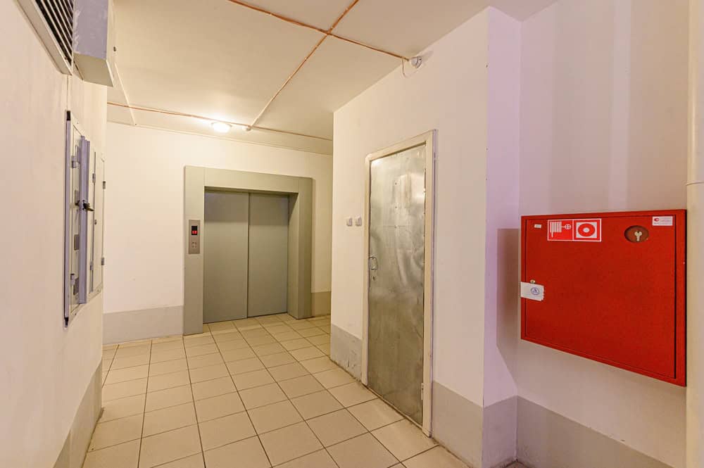 Hallway with View of Elevator